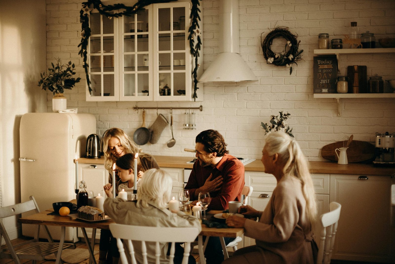 Family at a table with cake and plates